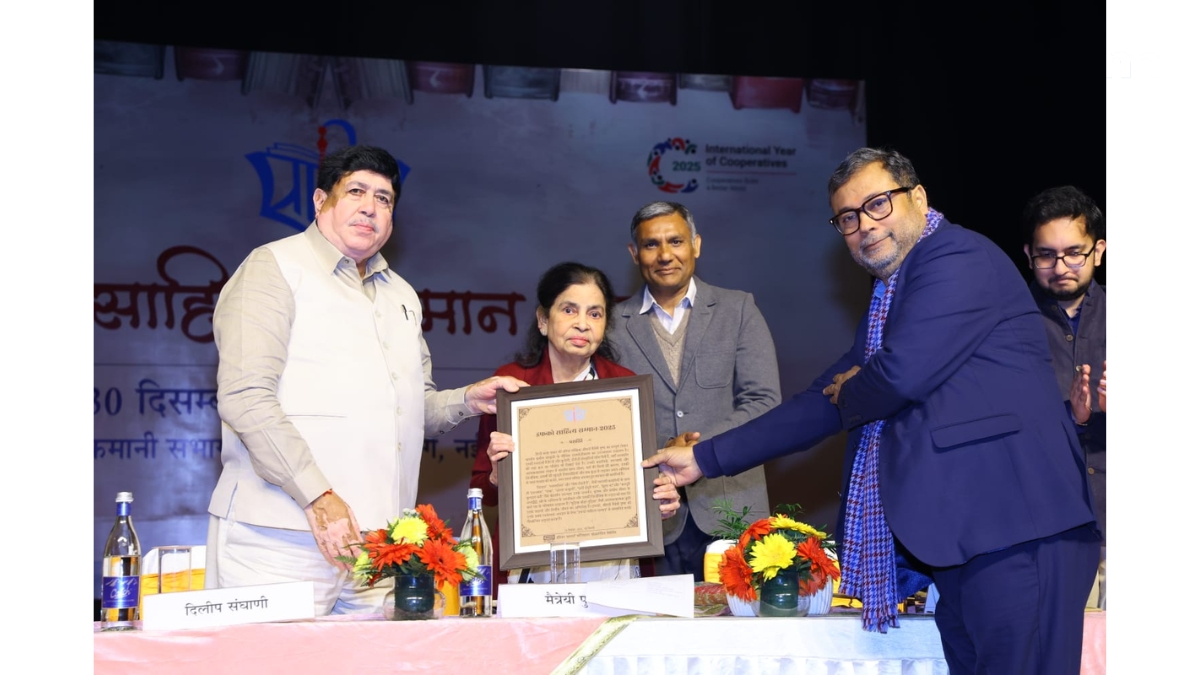 Award presentation at a formal event.IFFCO Sahitya Samman 2025 Awarded to Maitreyī Pushpa IFFCO Young Literary Award 2025 to Ankita Jain-PNN 